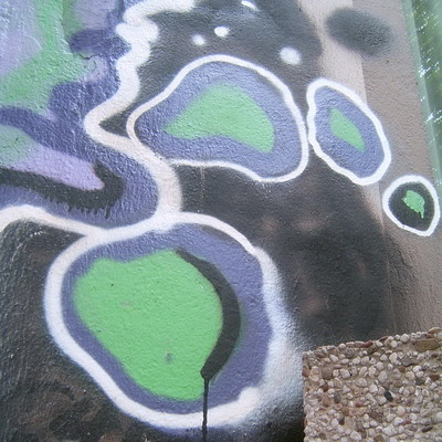 Graffiti and street art from a photo tour in Bremen including colourful sprayed tags and top-to-bottoms.