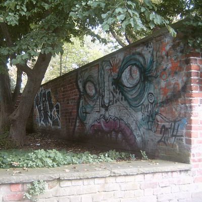 Graffiti and street art from a photo tour in Bremen including colourful sprayed tags and top-to-bottoms.