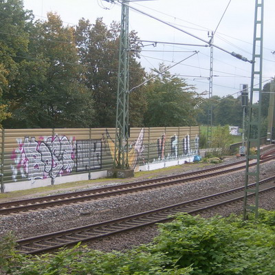 Graffiti and street art from a photo tour in Bremen including colourful sprayed tags and top-to-bottoms.