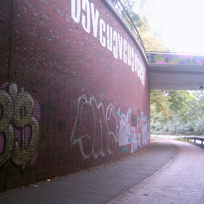 Graffiti and street art from a photo tour in Bremen including colourful sprayed tags and top-to-bottoms.