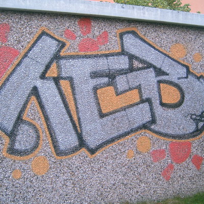 Graffiti and street art from a photo tour in Bremen including colourful sprayed tags and top-to-bottoms.