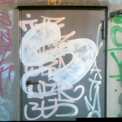 Graffiti and street art from a photo tour in Bremen including colourful sprayed tags and top-to-bottoms.