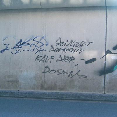 Graffiti and street art from a photo tour in Bremen including colourful sprayed tags and top-to-bottoms.