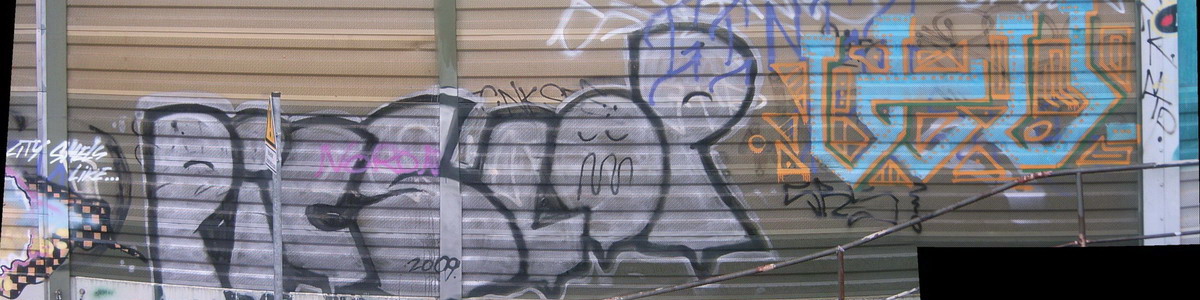 Graffiti and street art from a photo tour in Bremen including colourful sprayed tags and top-to-bottoms.